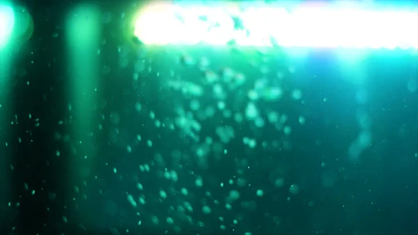 Вид сбоку на бурлящую воду с зеленой лампой на заднем плане. Рамка. Воздушные пузырьки под водой в пустом аквариуме . — стоковое фото