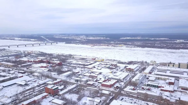 Top view of the railway tracks in the city in winter. Clip. Workers on the railway track. The view from the top. Urban railway background