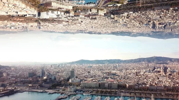 Modern city with mirror effect. Stock. Top view of big city landscape with effect of parallel realities. Panorama of big city is reflected in sky