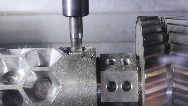 Metalworking cutting process by milling cutter. Media. CNC machine processes metal detail. Close-up of the metal workpiece processing on the latest machine — Stock Photo, Image