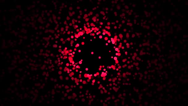 Красива абстракція дрібних барвистих частинок хаотично рухається на чорному тлі. Анімація. Динамічна барвиста анімація на чорному тлі — стокове відео