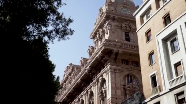 Detailed architectural old building in European city. Action. Beautiful old building made of red stone with many architectural details. Many detailed facade of old building — Stock Video