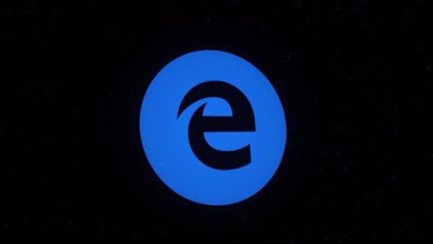 Digitální animace ikony Internet Explorer rozpadající se na různobarevné pohybující se částice na černém pozadí. Technologie, internet a vědecké zázemí — Stock video