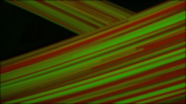 Abstract colored neon rays moving diagonally on black background, seamless loop. Animation. Illuminated blurred red and green lines, digital design concept. — Stock Video