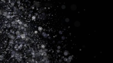 Siyah zemin üzerinde rüzgarda uçuşan soyut küçük yuvarlak parçacıklar, monokrom. Animasyon. Kaotik hareketlerle beyaz daireler.