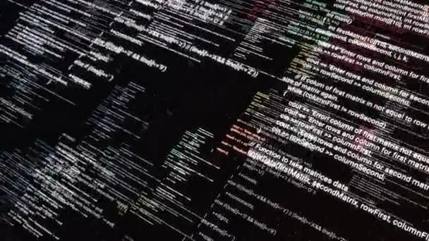Abstrakta symboler flyger diagonalt på svart skärm bakgrund. Animering. Datorprogramkoder som körs i en rullande rörelse på en bildskärm för PC. — Stockvideo
