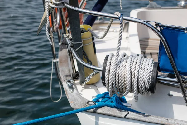 Rigging of deep-sea sailboats. Sailing accessories on a yacht. Season of the summer.
