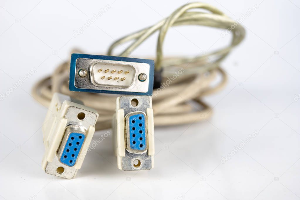 Old PC cables on a white table .. Com and lpt connectors for old computer stations. White background.