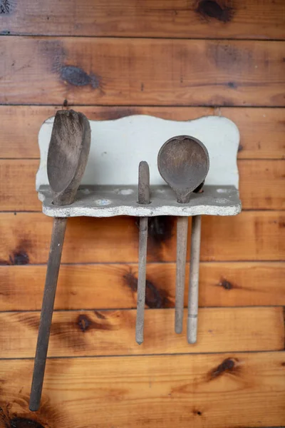 Old kitchen accessories. Kitchen utensils in an old kitchen room. Season of the autumn.