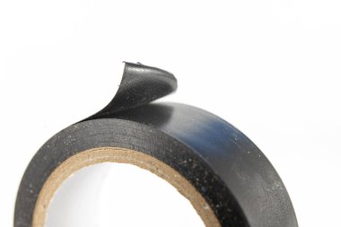 Küçük elektrik işleri için izolasyon bant. Malzemeler ve aksesuarlar, elektrikçi. Beyaz arka plan.