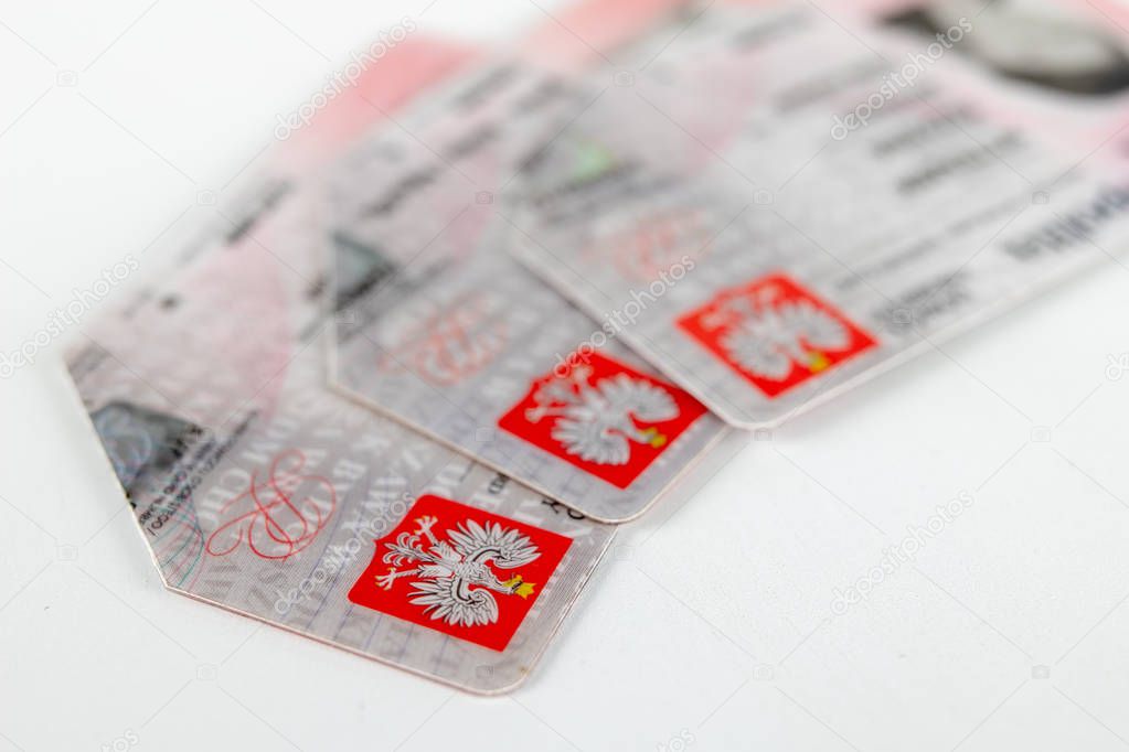 Polish ID card on a white table. An identification document with Polish serving to legitimize the residents. Light background.