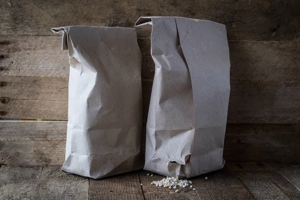 Food supplies stored in paper bags.