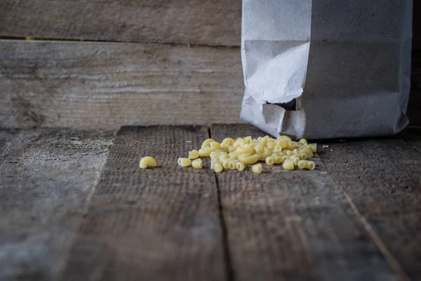 Food supplies stored in paper bags.