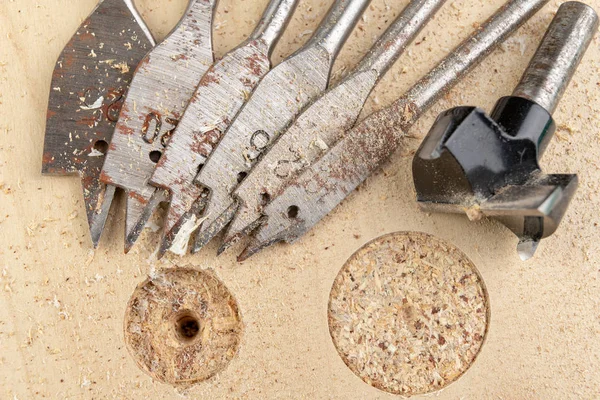 Drilling with a vane drill in chipboard. Carpentry work in a car — Stock Photo, Image