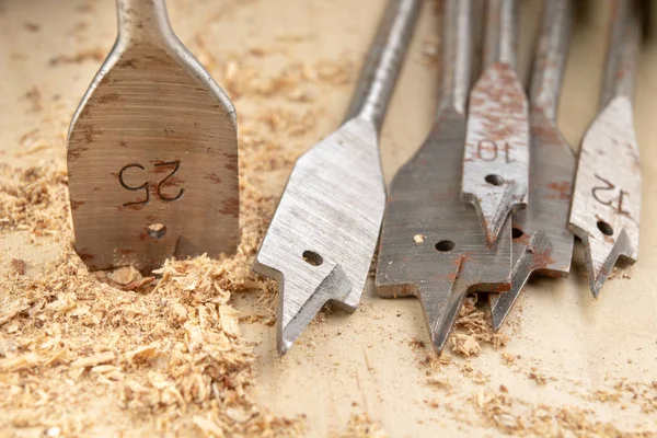 Drilling with a vane drill in chipboard. Carpentry work in a car — Stock Photo, Image