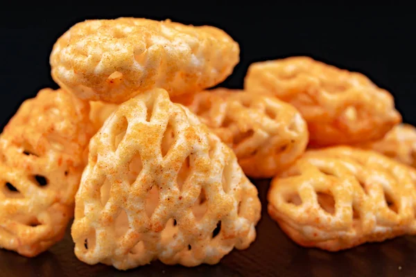 Fresh fudges on a dark kitchen table. Tasty snacks to crunch. — Stock Photo, Image