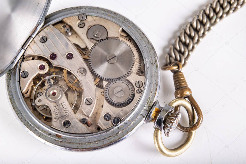 Old mechanism of an analog watch. Modes and mechanisms of the pr