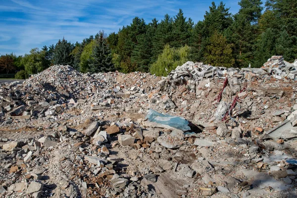 Pile of debris at the demolition of commercial buildings in the