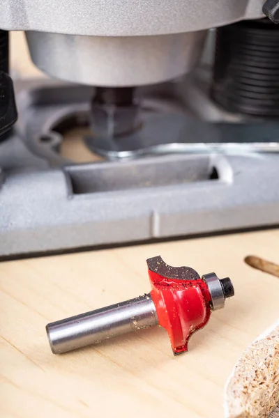Replacement of the milling cutter in the router. Joiner\'s accessories for small jobs. Workplace workshop.