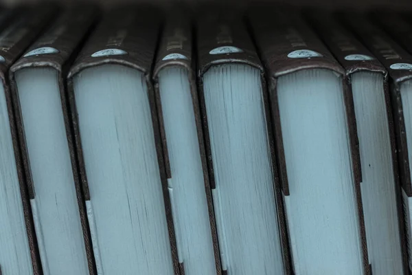 Background image of books. Book sheets texture. Binding. Books on the shelf in the library