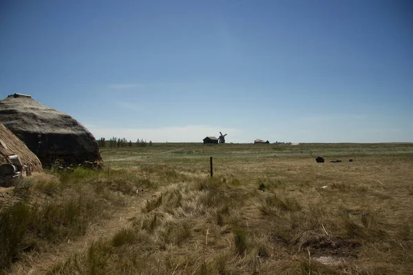 Ancient dwelling of an ancient man in the Arkaim reserve, Russia. Steppe.