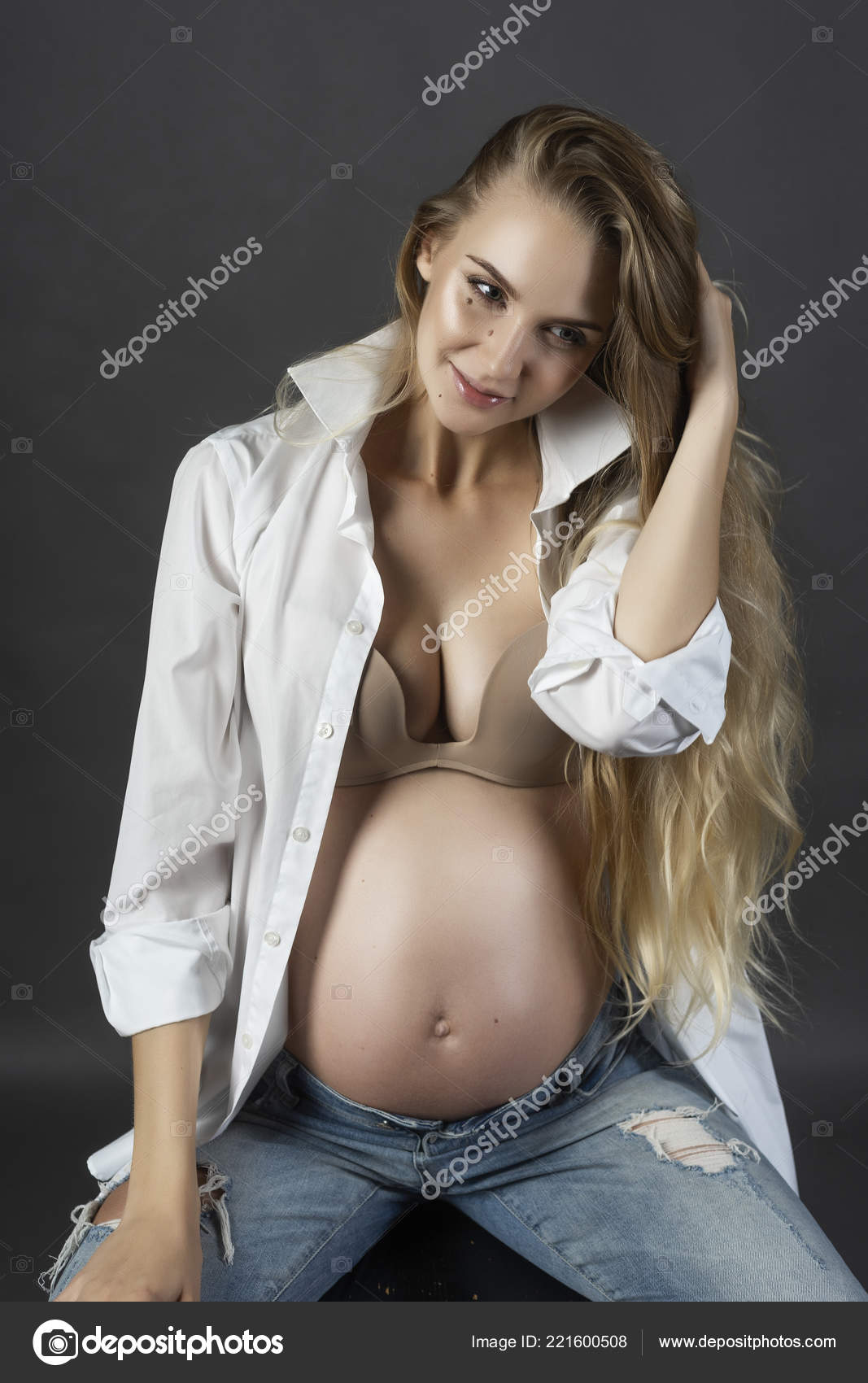 Long Hair Pregnant Nude - Beautiful Smiling Pregnant Young Blond Woman Wearing Ripped ...