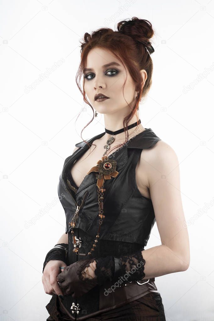 A beautiful redhead cosplayer girl wearing a Victorian-style ste