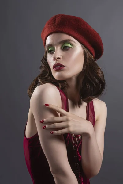 Beautiful girl wearing french style red beret and body, and blac — Stock Photo, Image