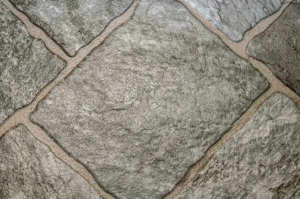 Saf gri parlak cobblestones closeup yukarıdan fotoğrafı edikula şeklinde