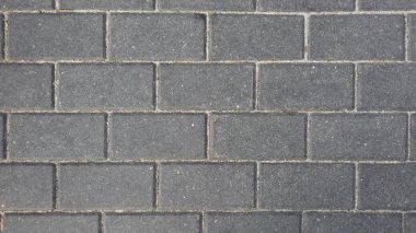 Kaldırım dikdörtgen gri cobblestones. Üstten görünüm