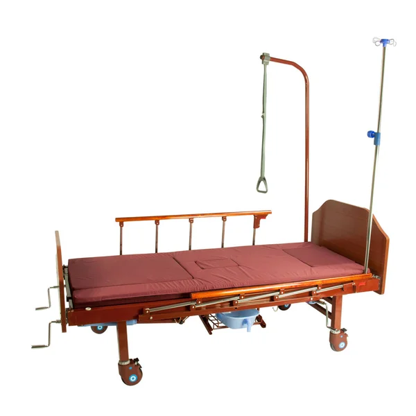Tıbbi Kahverengi Metal Yarı Otomatik Yatağa Ile Bordo Yatak Üzerinde — Stok fotoğraf