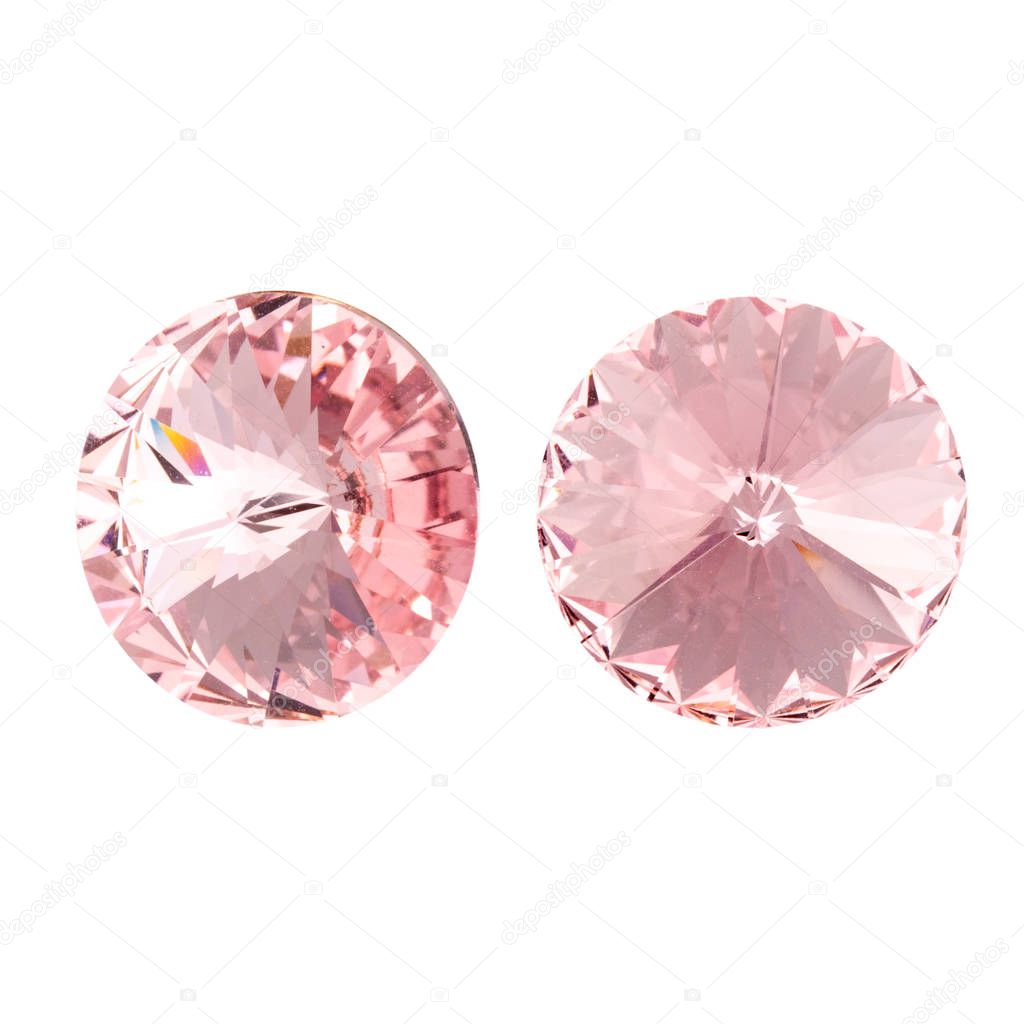 Large round pink crystal rhinestones. Front and side view. Isolated on white.