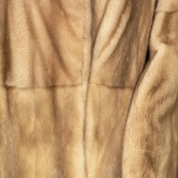 Текстура из натурального коричневого и бежевого меха — стоковое фото