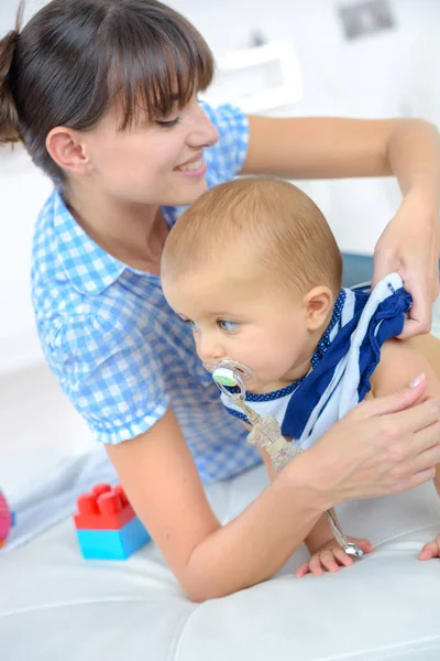 Portrait of happy mother and baby — Stock Photo, Image