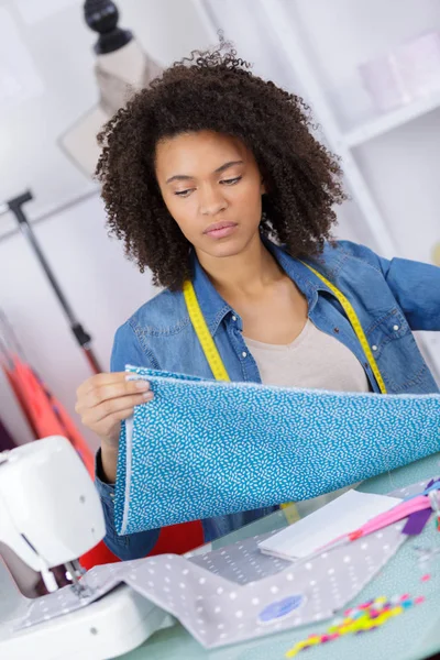 Working from home a tailor at work — Stock Photo, Image