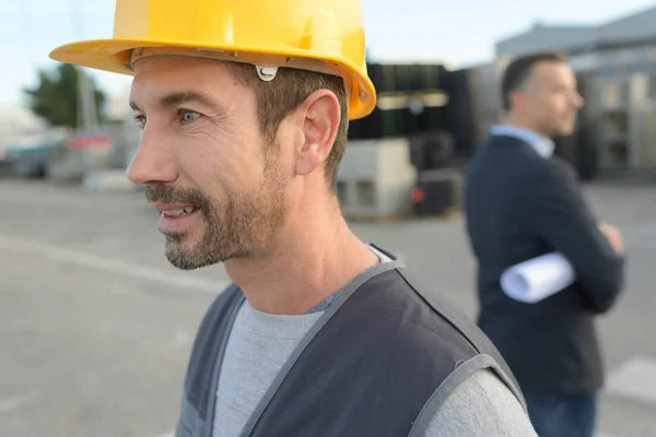 Profil av workman bär hardhat — Stockfoto