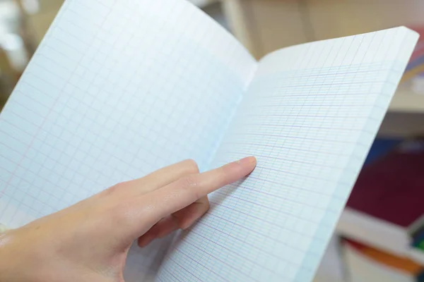 Wskazując Notebook Schoolbook — Zdjęcie stockowe