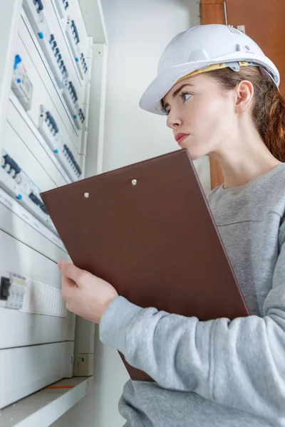 Electrical inspector checking the panel — Stock Photo, Image