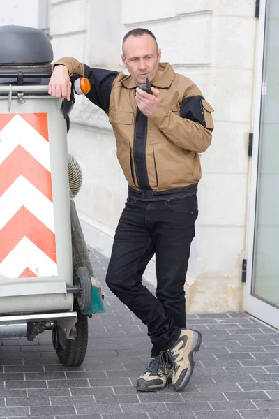 Unhappy male street cleaner — Stock Photo, Image