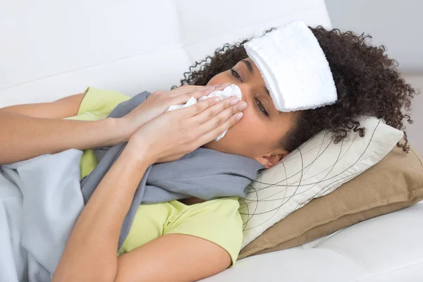 Woman with colds and fever — Stock Photo, Image