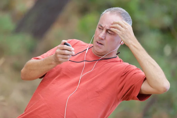 Runner Checking His Heart Rate Pulse Workout — Stock Photo, Image