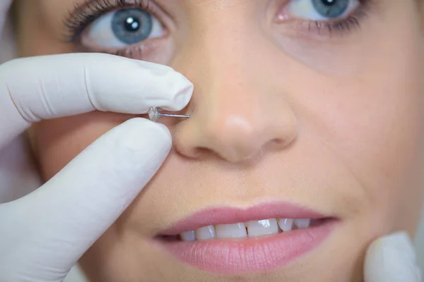 Piercing Being Held Woman Nose — Stock Photo, Image