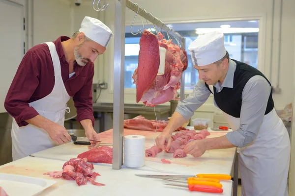 Die fleißigen Metzger und die Arbeit — Stockfoto