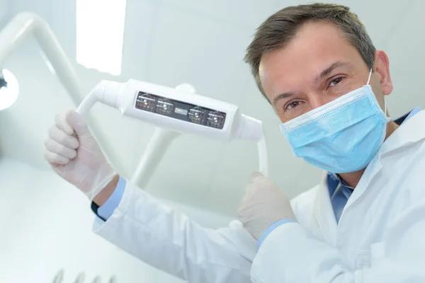 Portrait of male dentist in surgical mask — Stock Photo, Image