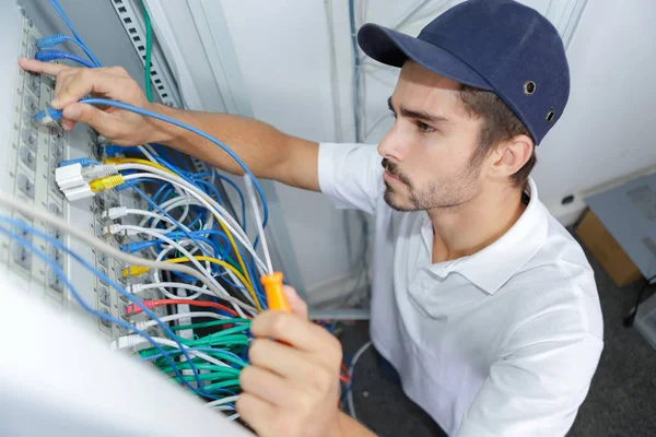 Electrician wiring electrical panel — Stock Photo, Image