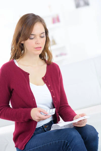 Woman reading the prescription — Stock Photo, Image