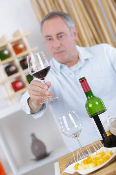 Elegant man tasting wine — Stock Photo, Image