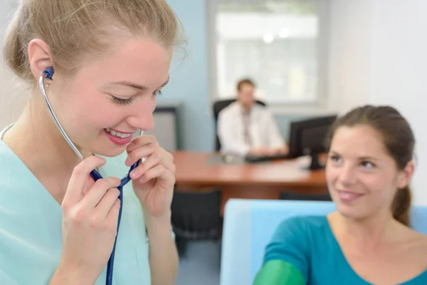 Young female doctor with stethoscope — Stock Photo, Image