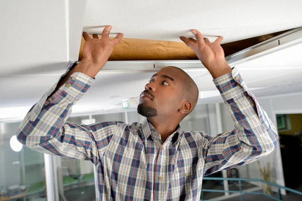 Checking Ceiling Panel — Stock Photo, Image