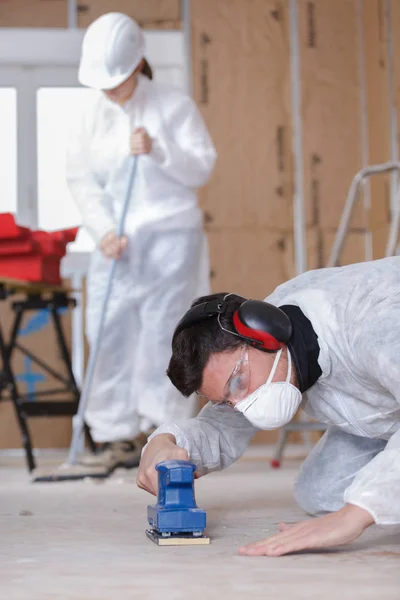 Piano Levigatura Dei Lavoratori Cantiere — Foto Stock